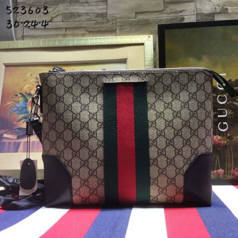 G*u*i clutch bags